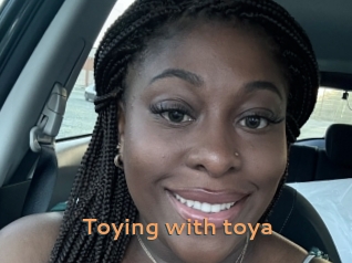 Toying_with_toya